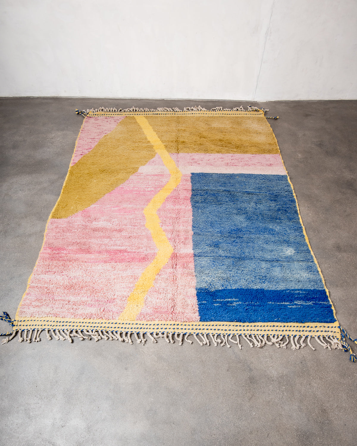 Modern, designer, handcrafted Berber rug from Morocco. Beniourain carpet with beautiful colours and patterns and fluffy wool texture.